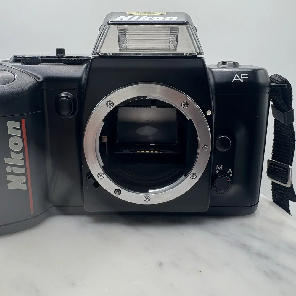 Vintage Nikon N4004 AF 35mm SLR Film Camera Body Only W/ Manuals Bag Powers On